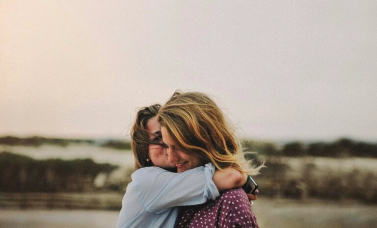 sisters hugging